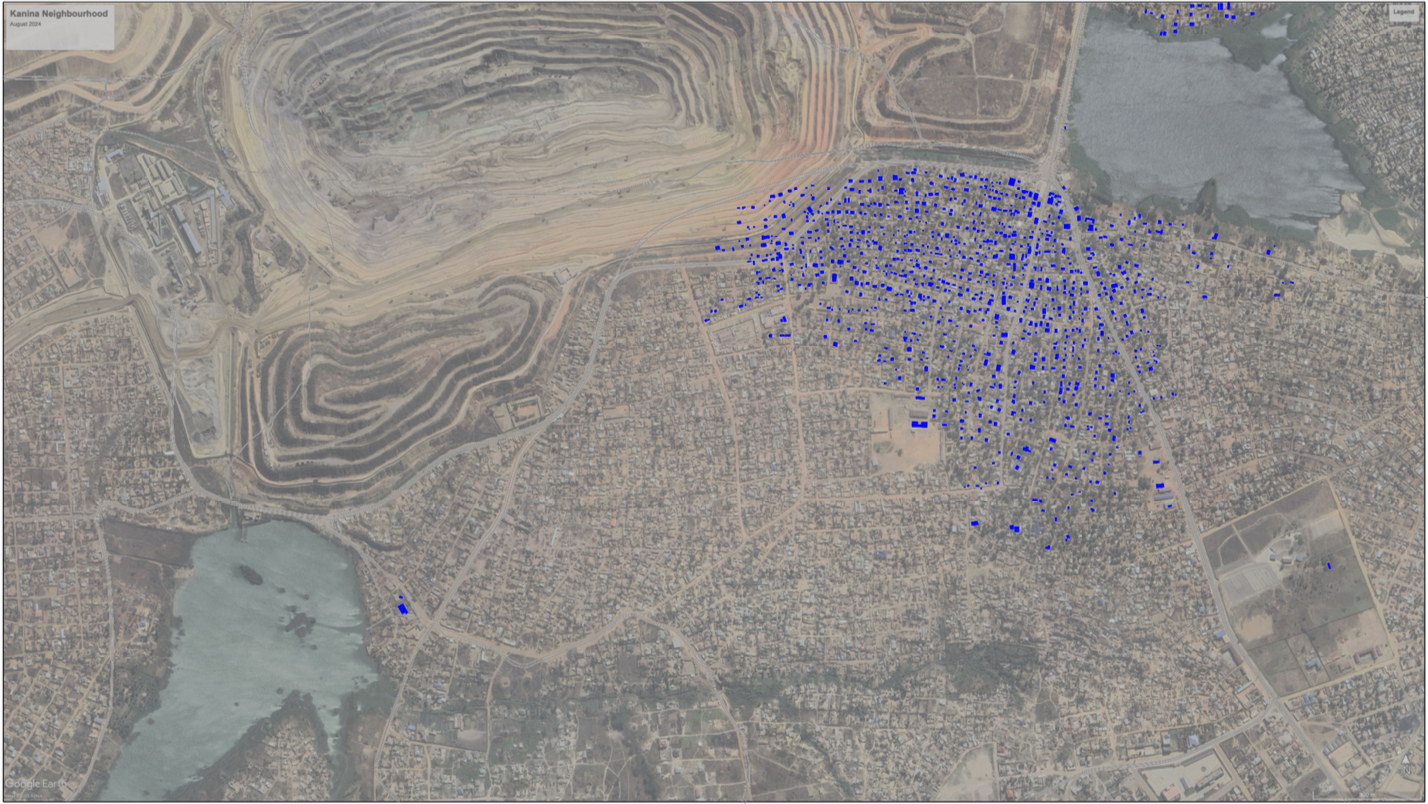 Satellite view of the Kanina neighbourhood in August 2024, with blue dots marking individual buildings, showing the dense informal settlement abutting a large open-pit mine.